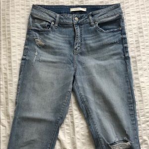 Distressed light wash jeans